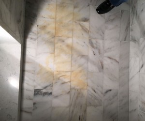 Shower floor cleaning and sealing