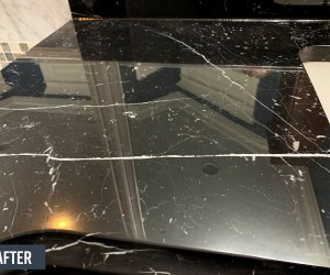 Black marble vanity top after restoration