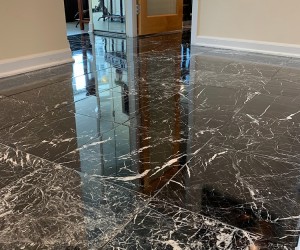 Black marble floor restoration  in Downtown Chicago